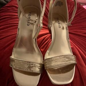 Torrid size 7th wide with gold sequin stilettos